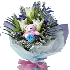 Casa Blanca w/ Babys Breath and Greenery in a Bouquet  and Mini Teddy Bear