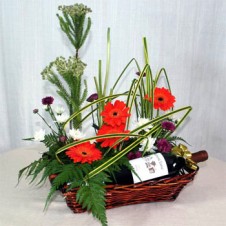 Flowers in a Basket with Sparkling Juice