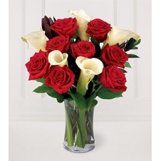 A Nice Presentation of Red Roses with Calla lily in a Vase