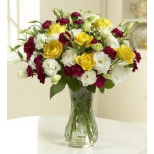Two Dozen Mixed Colored Flowers in a Vase