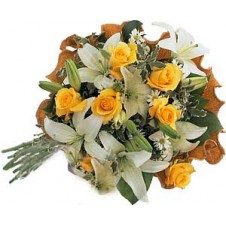 Beautiful Yellow Roses and White Lilies in a Bouquet 