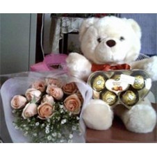 Bear With 1 Dozen Rose in a Bouquet  and Chocolate