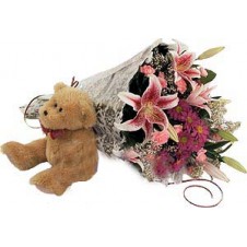 Pink and Mauve Tones in a Bouquet with Teddy Bear