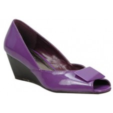 Peep toe wedge with an interesting upper decor by Manels