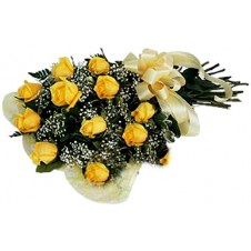 One dozen Yellow Roses With Added Delicate Flowers in a Bouquet