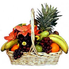 A White Basket Of Full Fresh Fruits